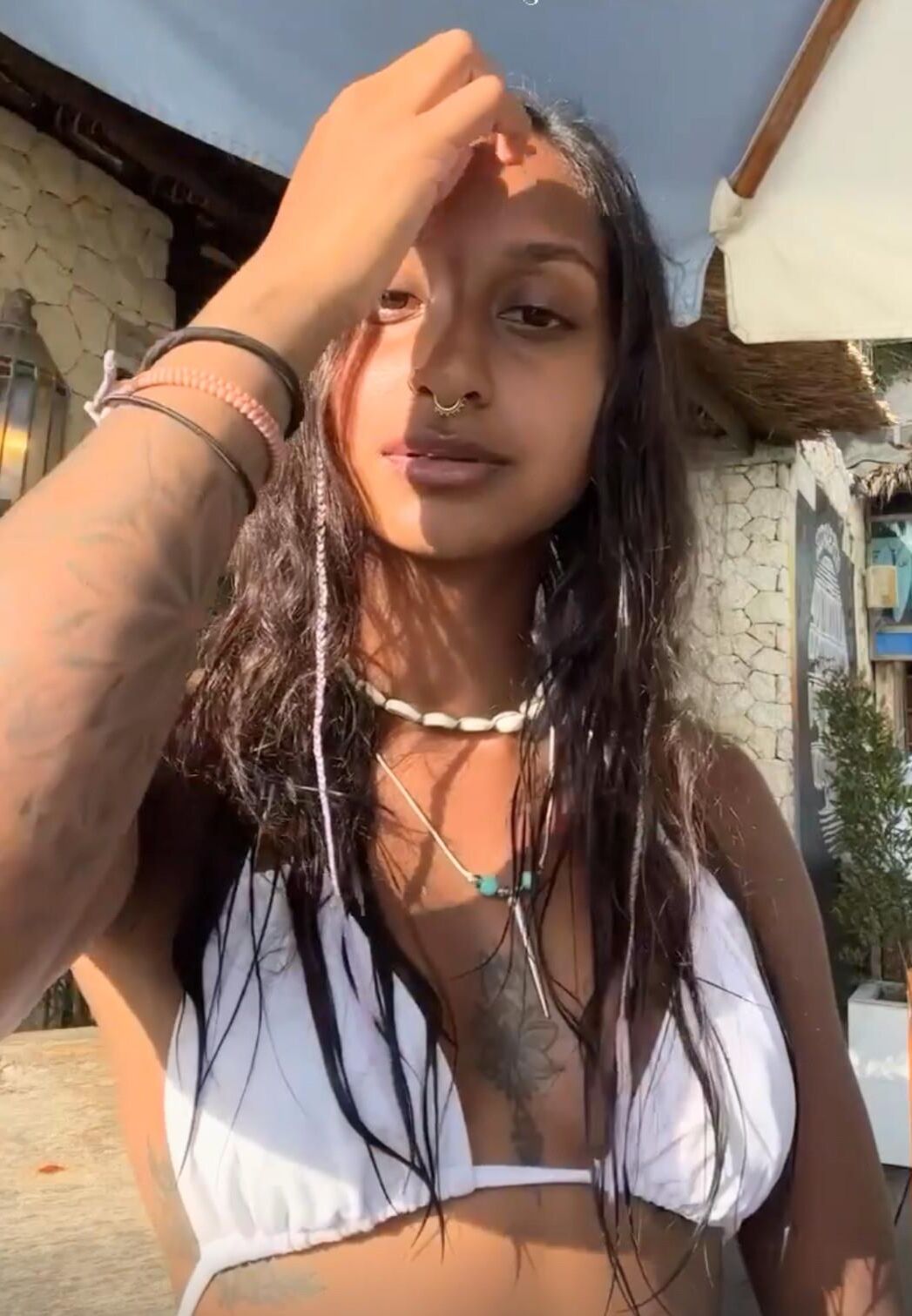 Jitta White bikini portrait.