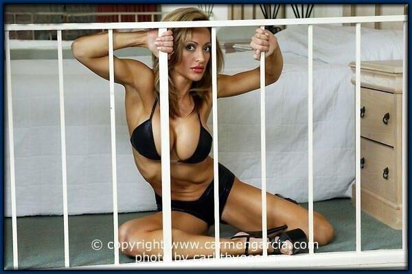 Carmen Garcia in a black bikini and heels