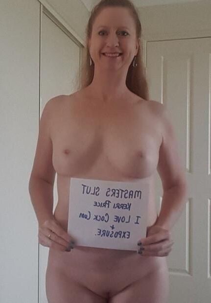 naked women holding signs 