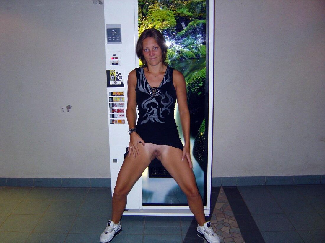 Women Standing Naked Commando Wearing a Watch