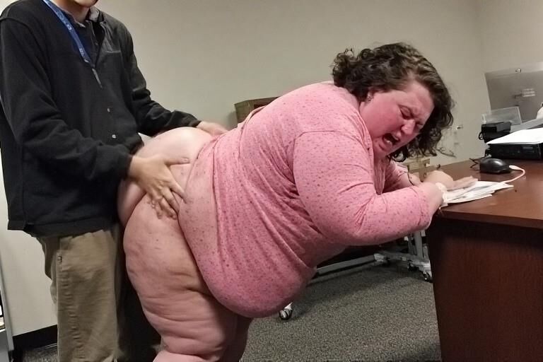Bent over desks
