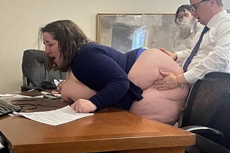 Bent over desks