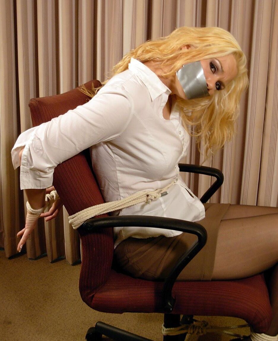 Kordelia Restrained in the Office Armchair