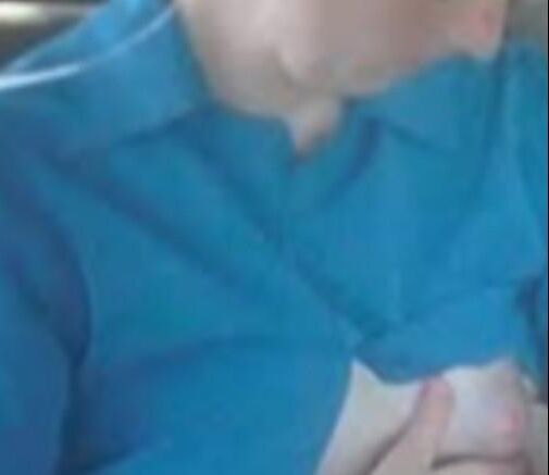 Amish Woman Breastfeeding Blue Dress