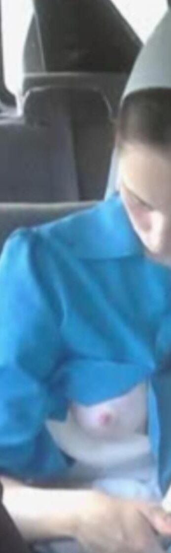 Amish Woman Breastfeeding Blue Dress