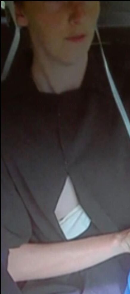 Amish Woman Breastfeeding Brown Dress