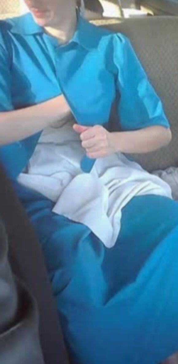 Amish Woman Breastfeeding Blue Dress