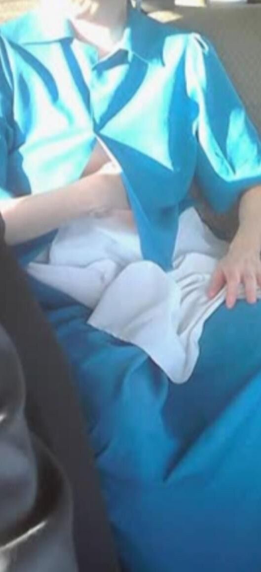 Amish Woman Breastfeeding Blue Dress