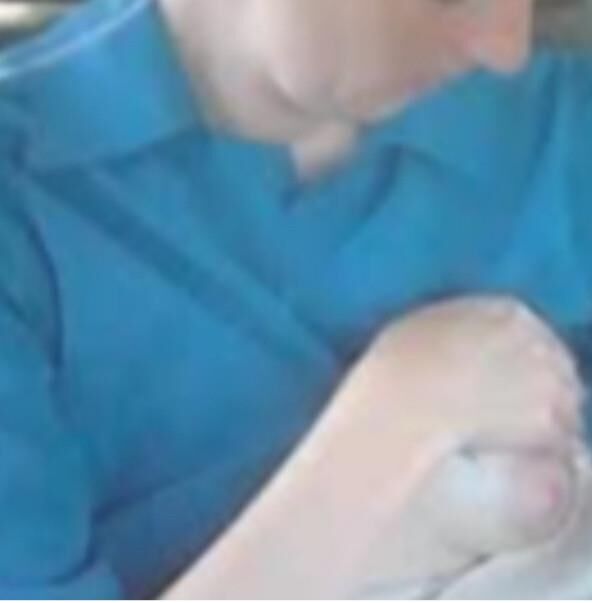 Amish Woman Breastfeeding Blue Dress