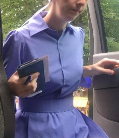 Amish Woman Breastfeeding Blue Dress