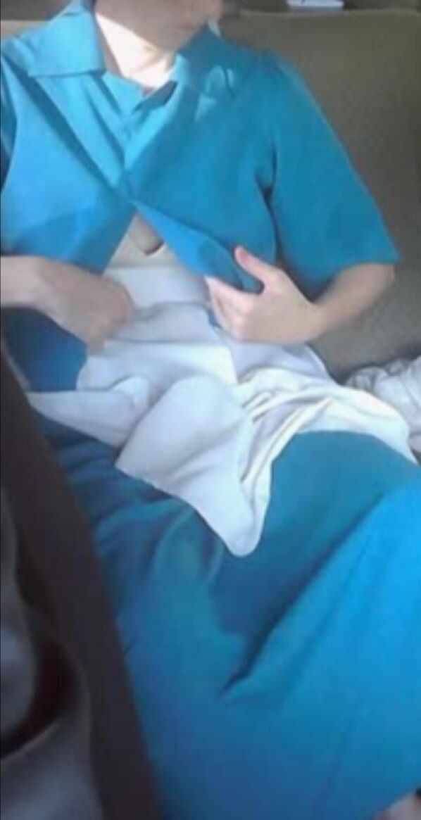 Amish Woman Breastfeeding Blue Dress