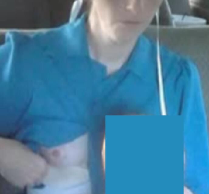Amish Woman Breastfeeding Blue Dress