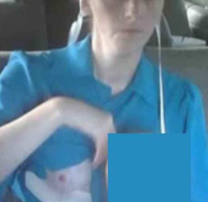 Amish Woman Breastfeeding Blue Dress