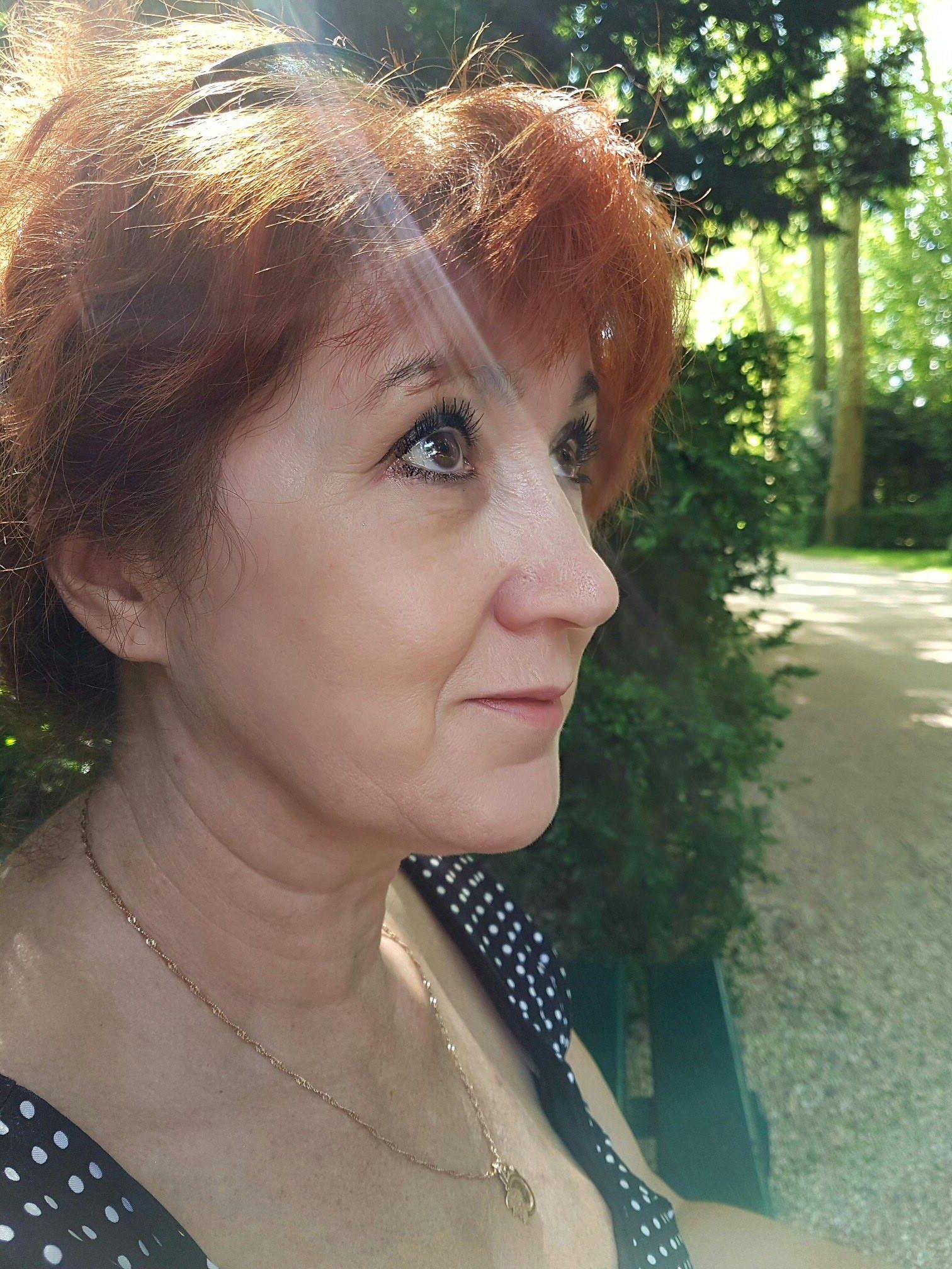 Redhead mature Tatiana from France