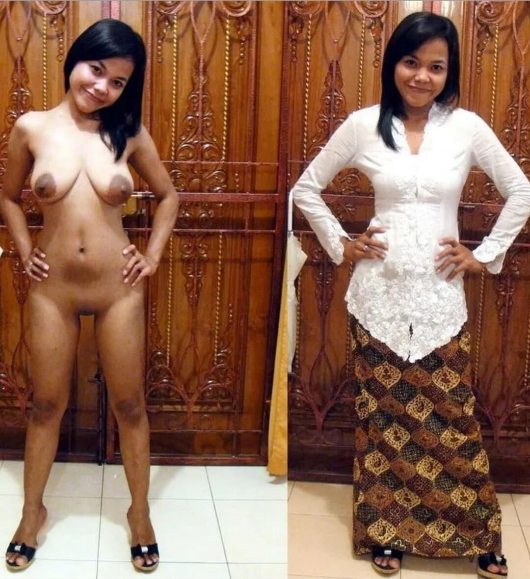 服を脱いだアジア人