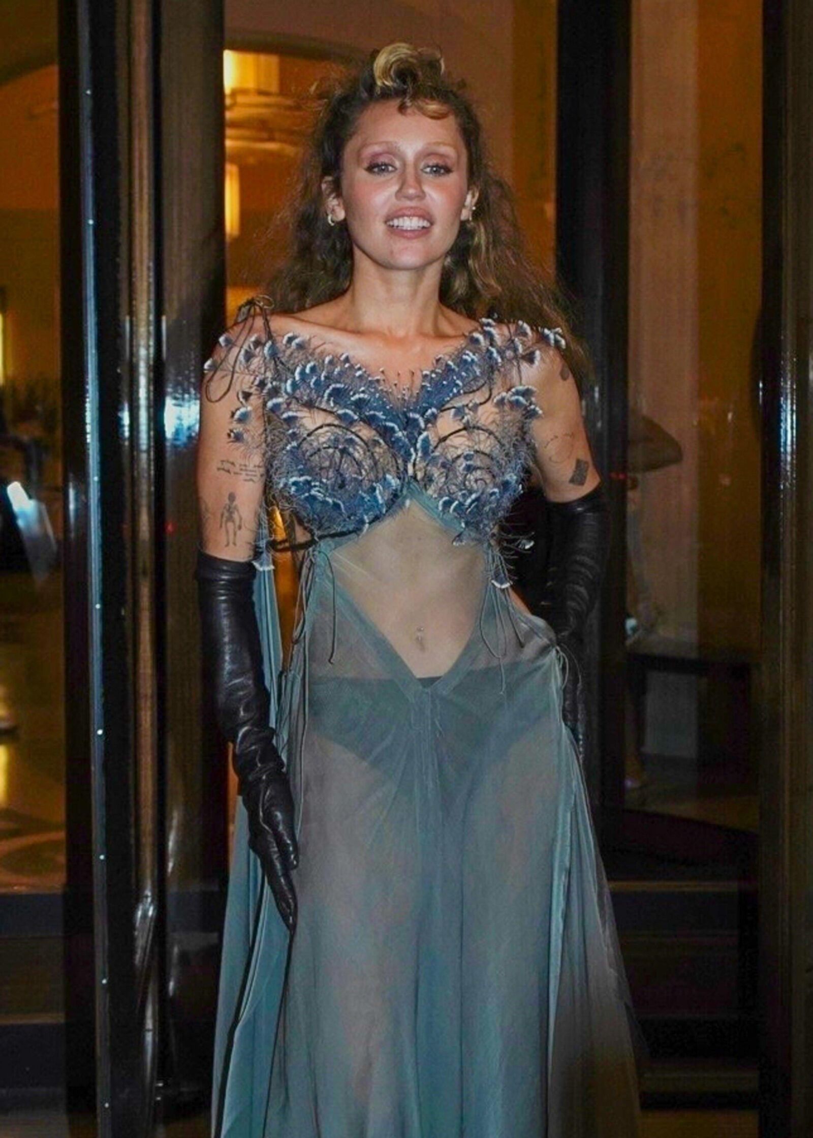 Miley Cyrus Seen outside her Hotel in Paris