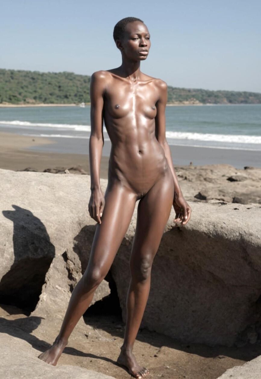 Slender muscular black goddess all nude in her natural habitat