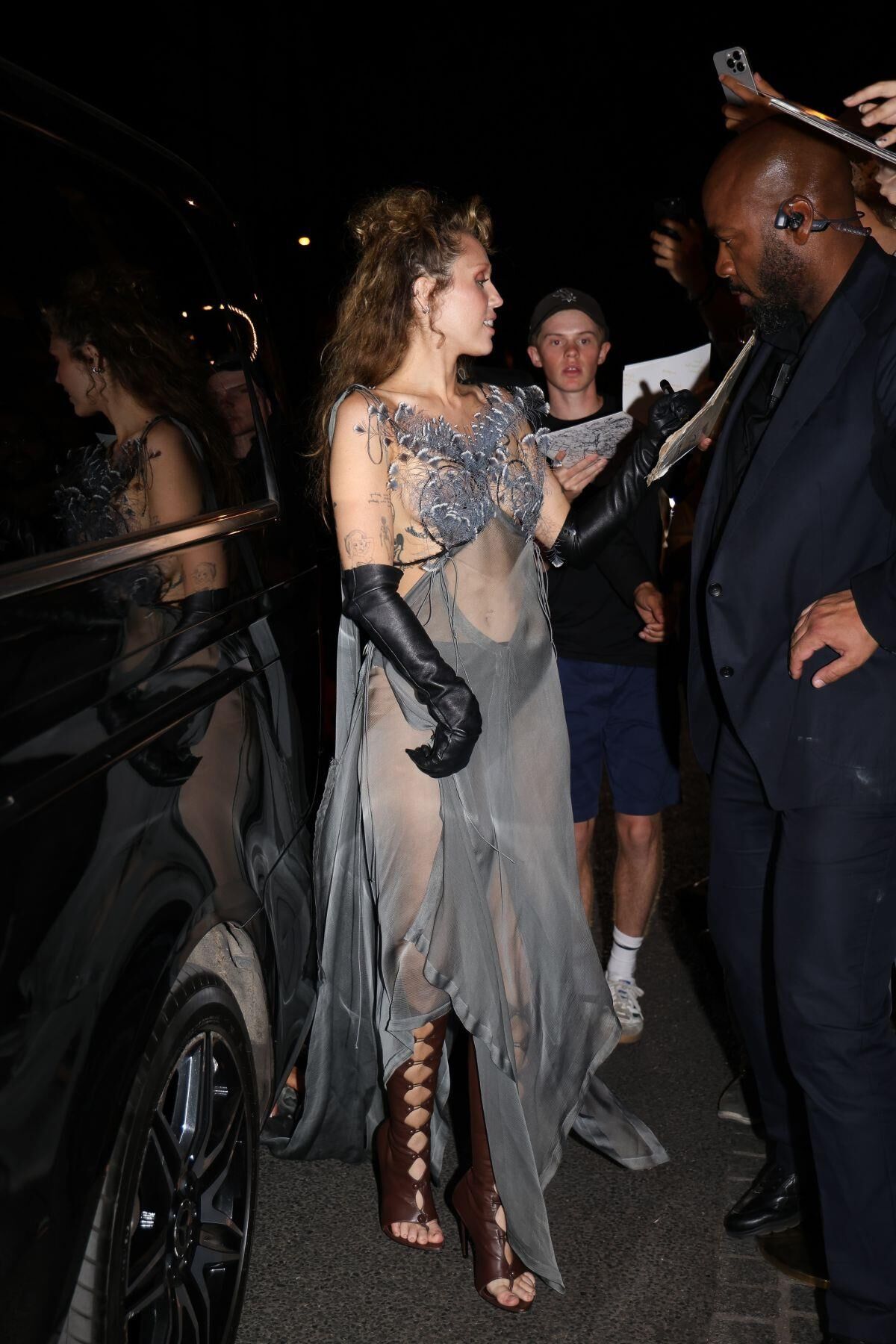 Miley Cyrus Seen outside her Hotel in Paris