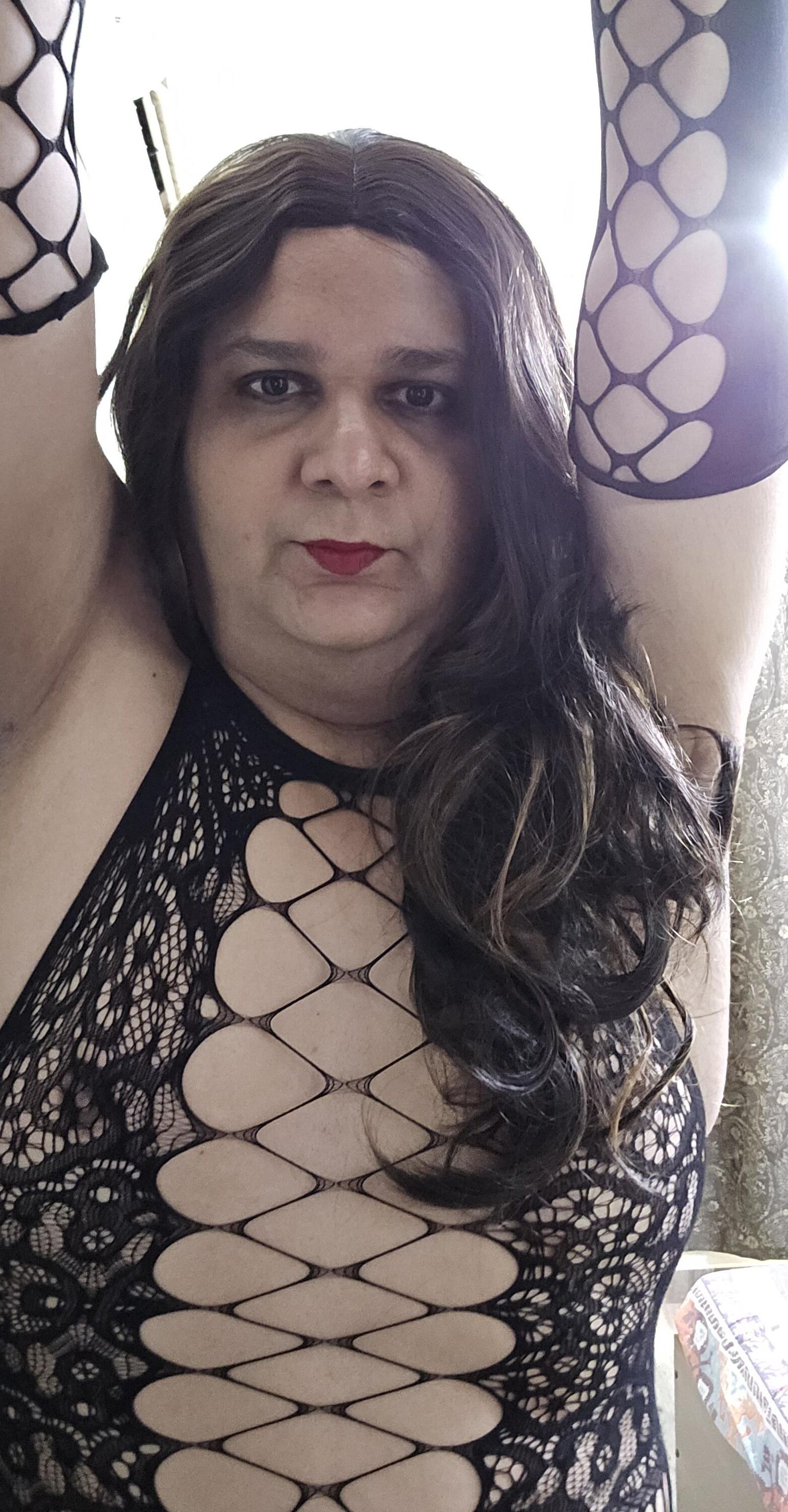 brunette shemale monica m shows off in mini fishnets stockings 