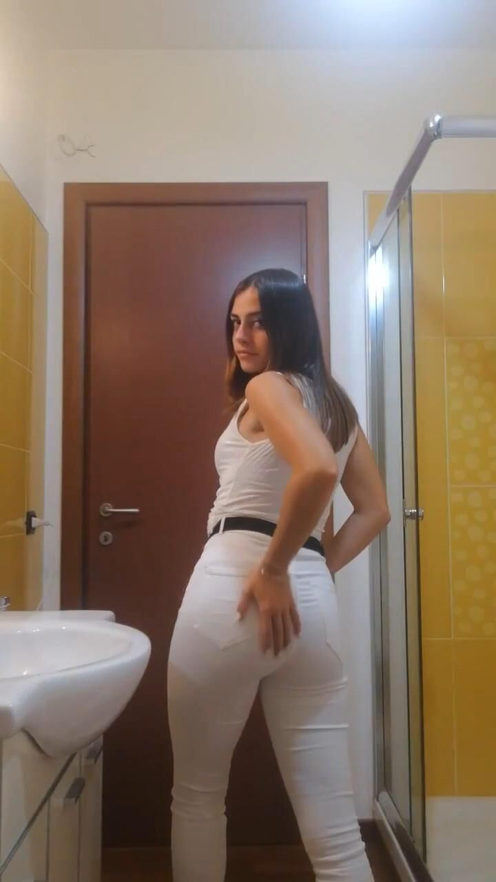 A young cat with small tits and a delicious ass