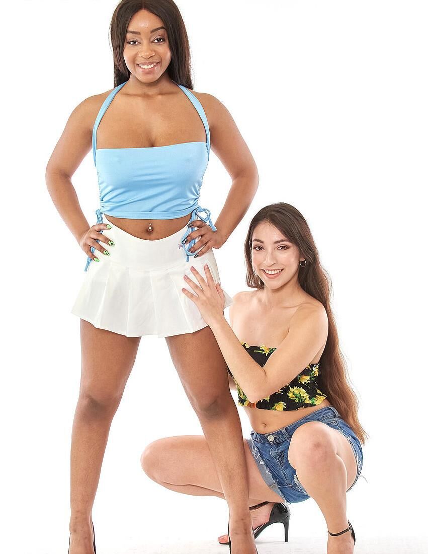 Black women with kneeling white girls.