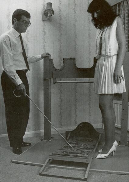 Retro Spanking from Janus white mini skirt on chair