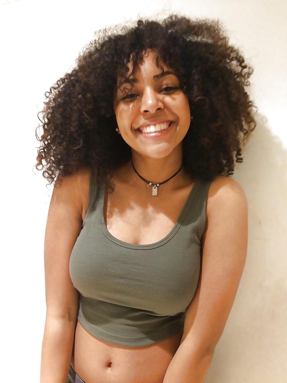 Top Busting Black Tits