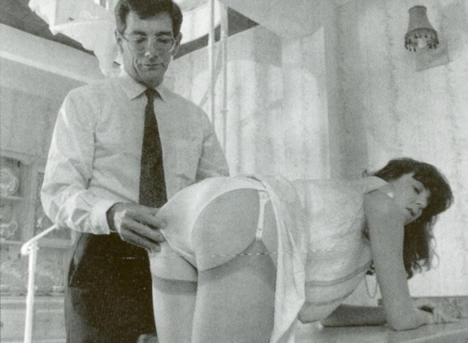 Retro Spanking from Janus white mini skirt on chair
