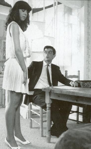 Retro Spanking from Janus white mini skirt on chair