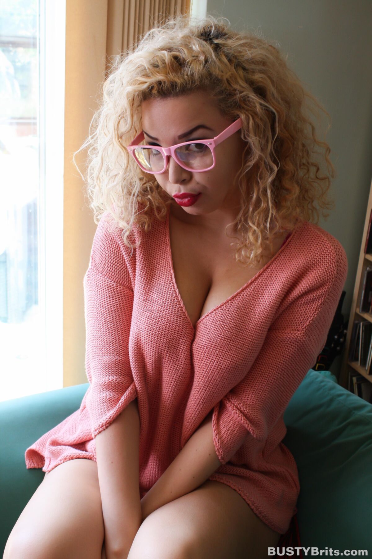Aruba Jasmine Cute Busty British Blonde Latina in a Pink Sweater