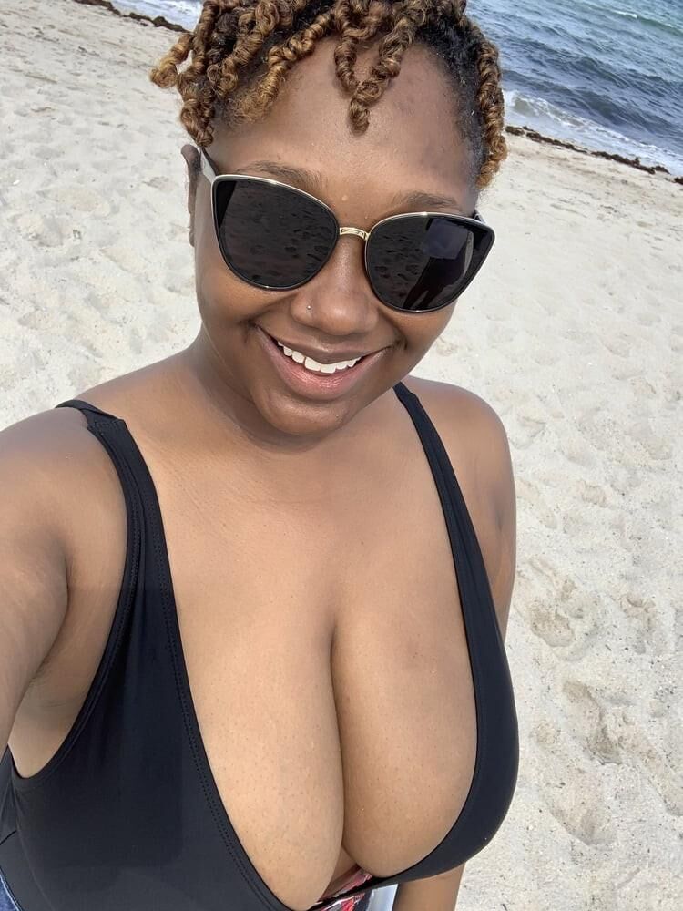 Top Busting Black Tits