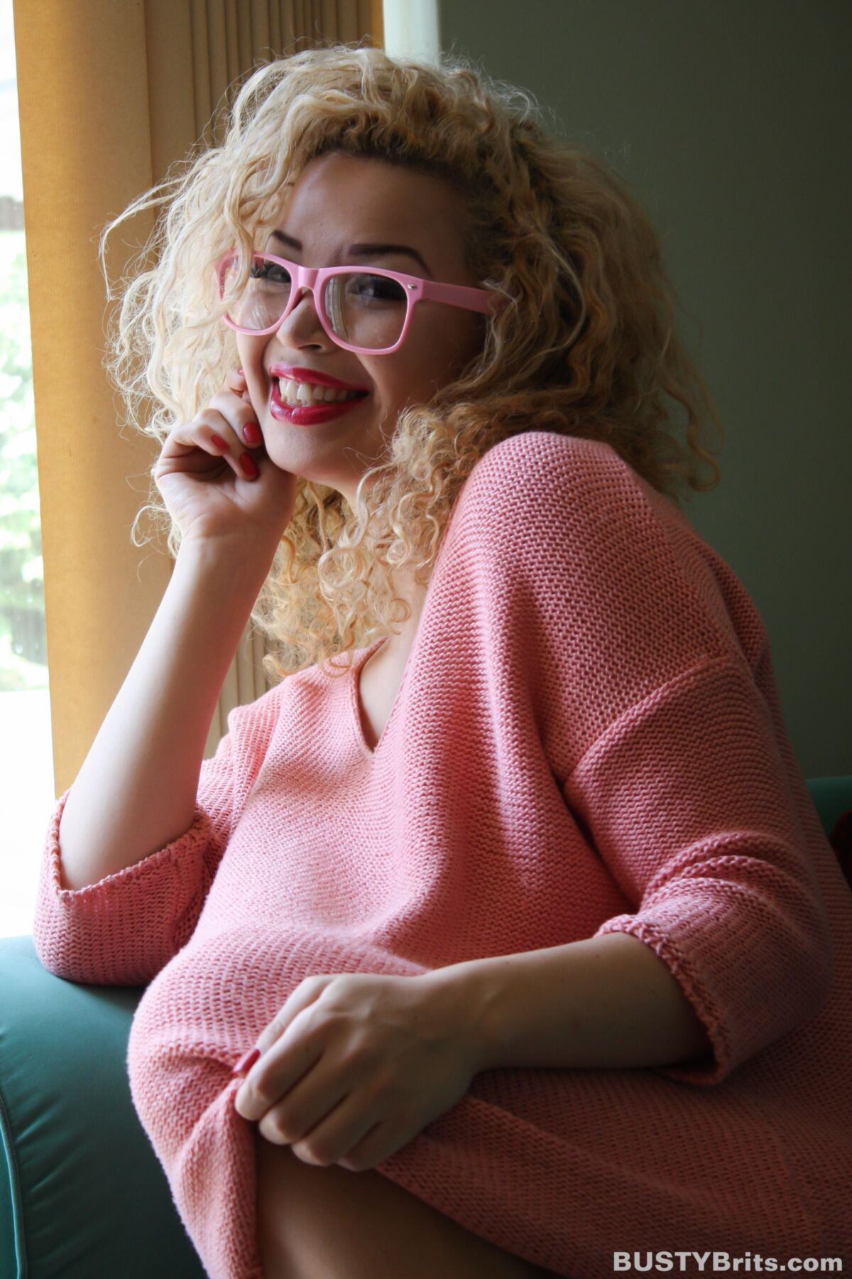 Aruba Jasmine Cute Busty British Blonde Latina in a Pink Sweater