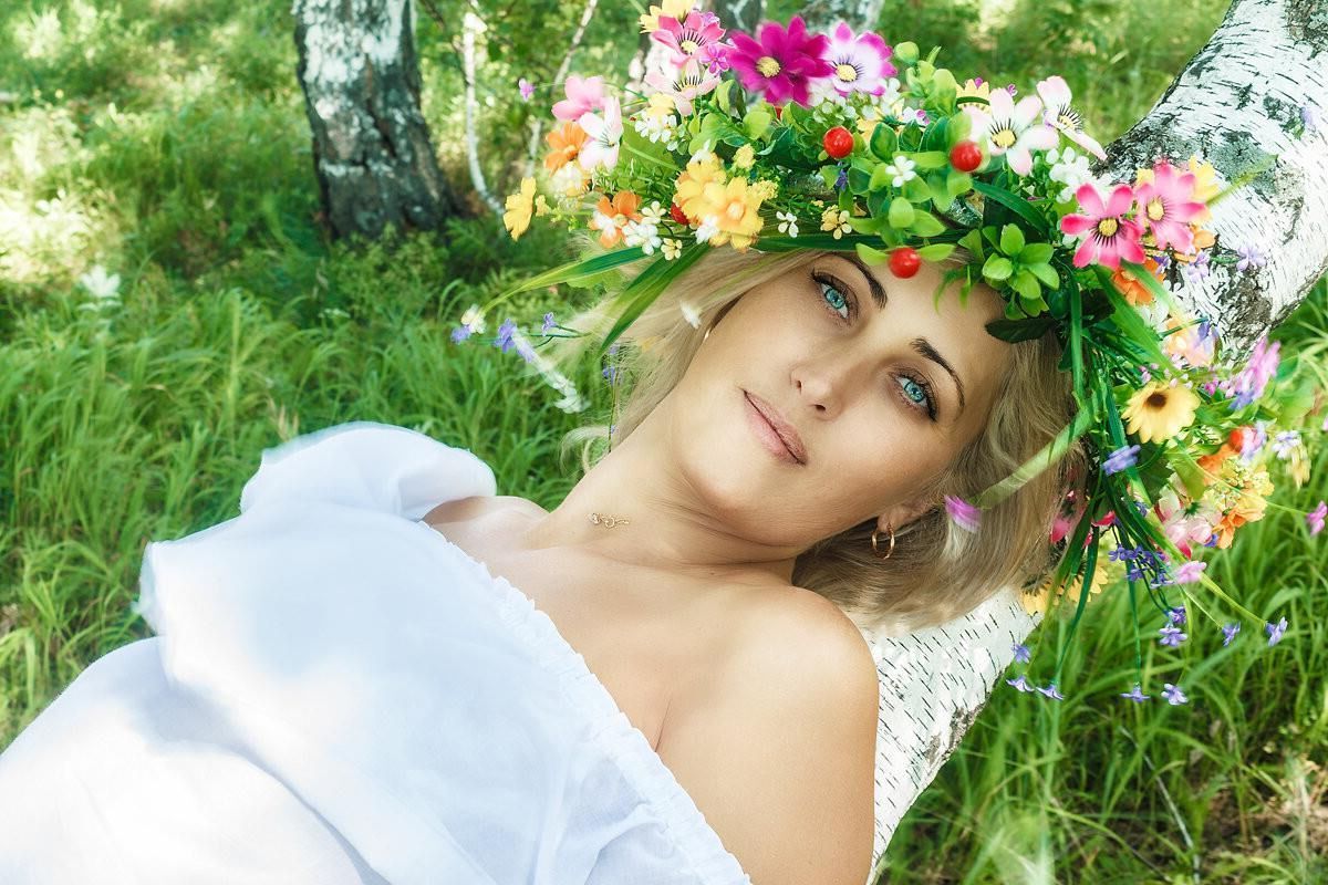 Blonde Anzhelika on the grass