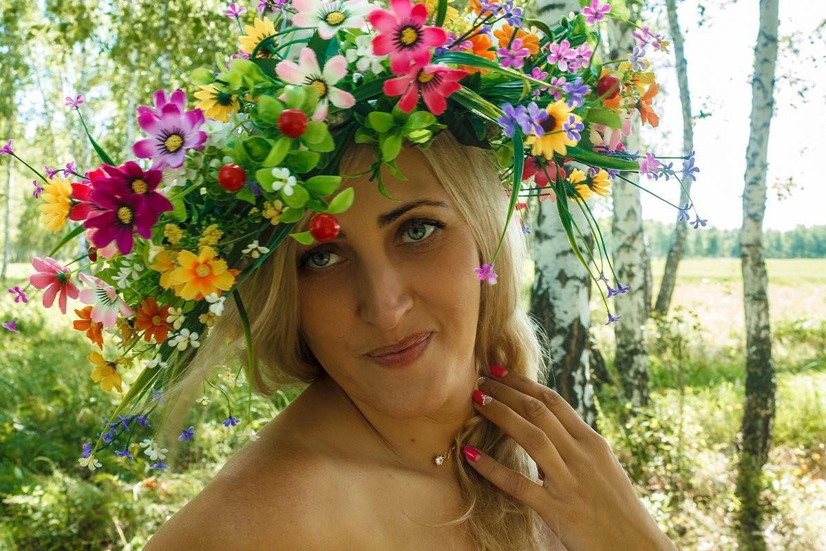 Blonde Anzhelika on the grass