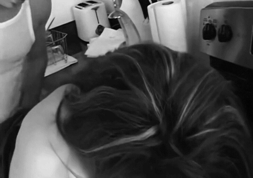 Cheating brunette wife in the kitchen