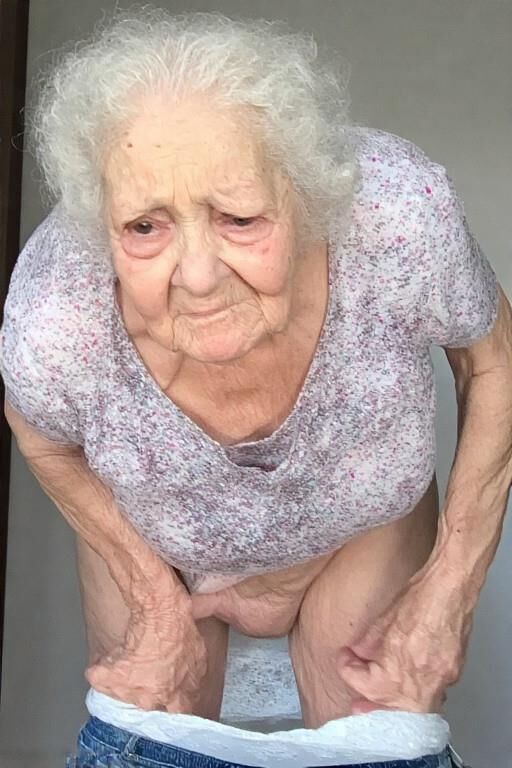 Granny Struggles to Put on Her Pants