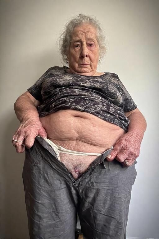 Granny Struggles to Put on Her Pants