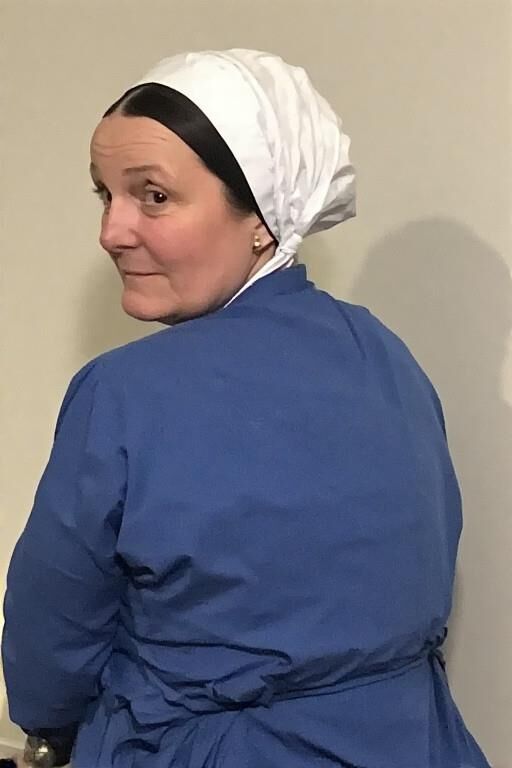 Amish Women in the Barn