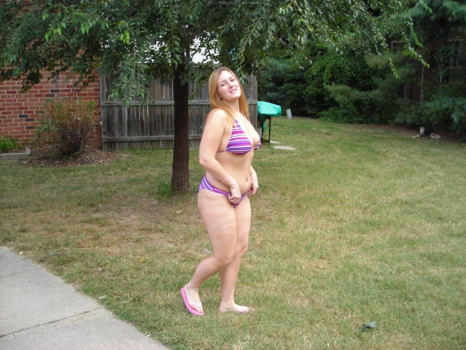Chubby young wife taking naughty pics at home