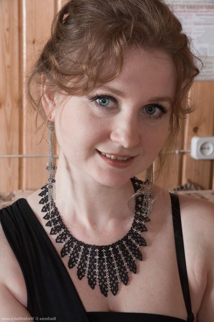 Beautiful redhead milf Bazhena with hard nipples