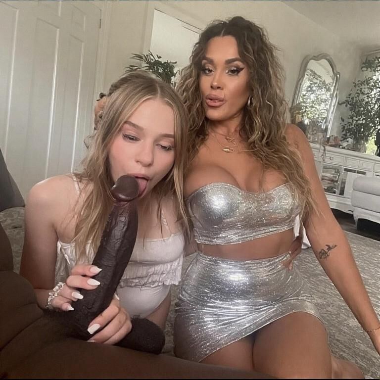 Mother Daughter sharing some chocolate ((BBC)AI)