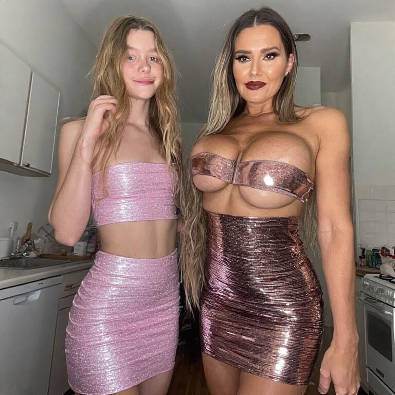 Mother Daughter sharing some chocolate ((BBC)AI)