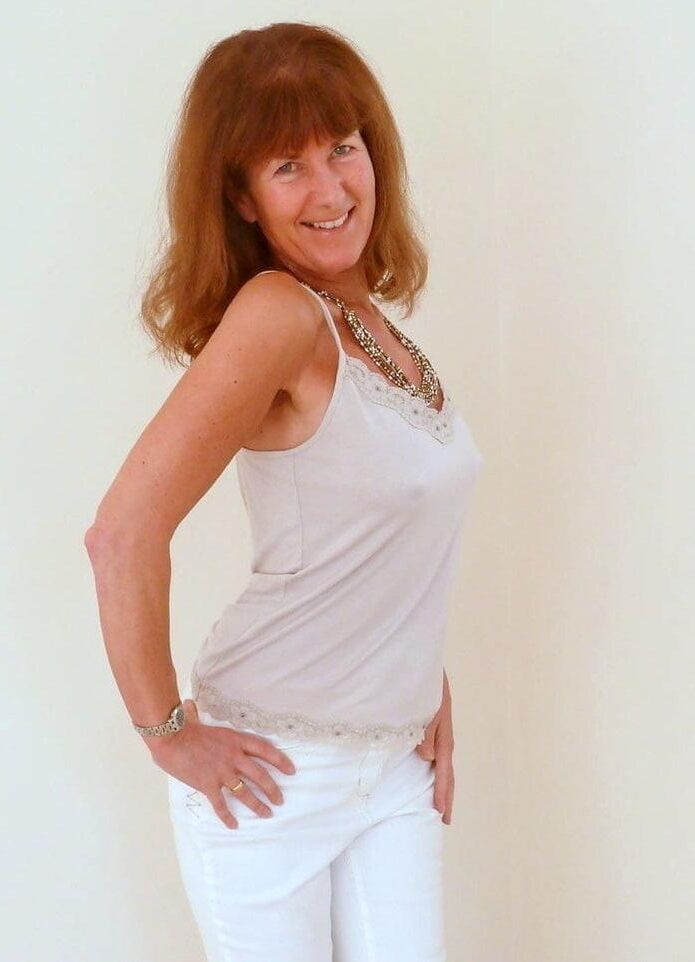 Slim mature redhead Anne from UK