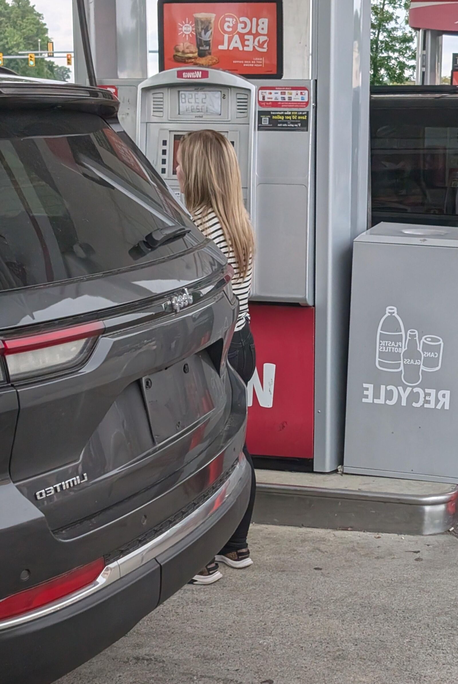 Cute blonde at gas station 