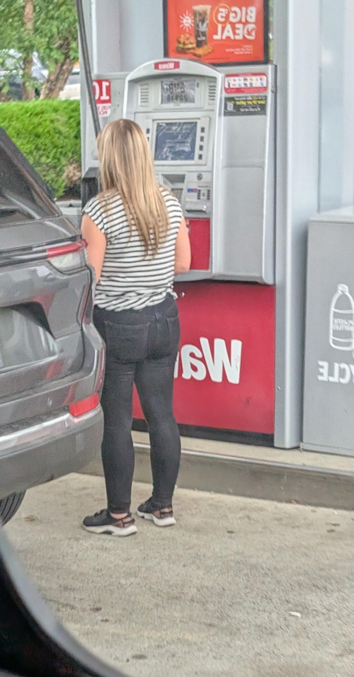Cute blonde at gas station 