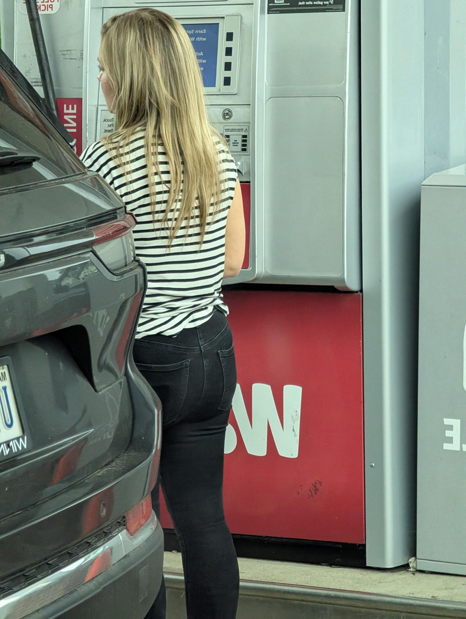 Cute blonde at gas station 