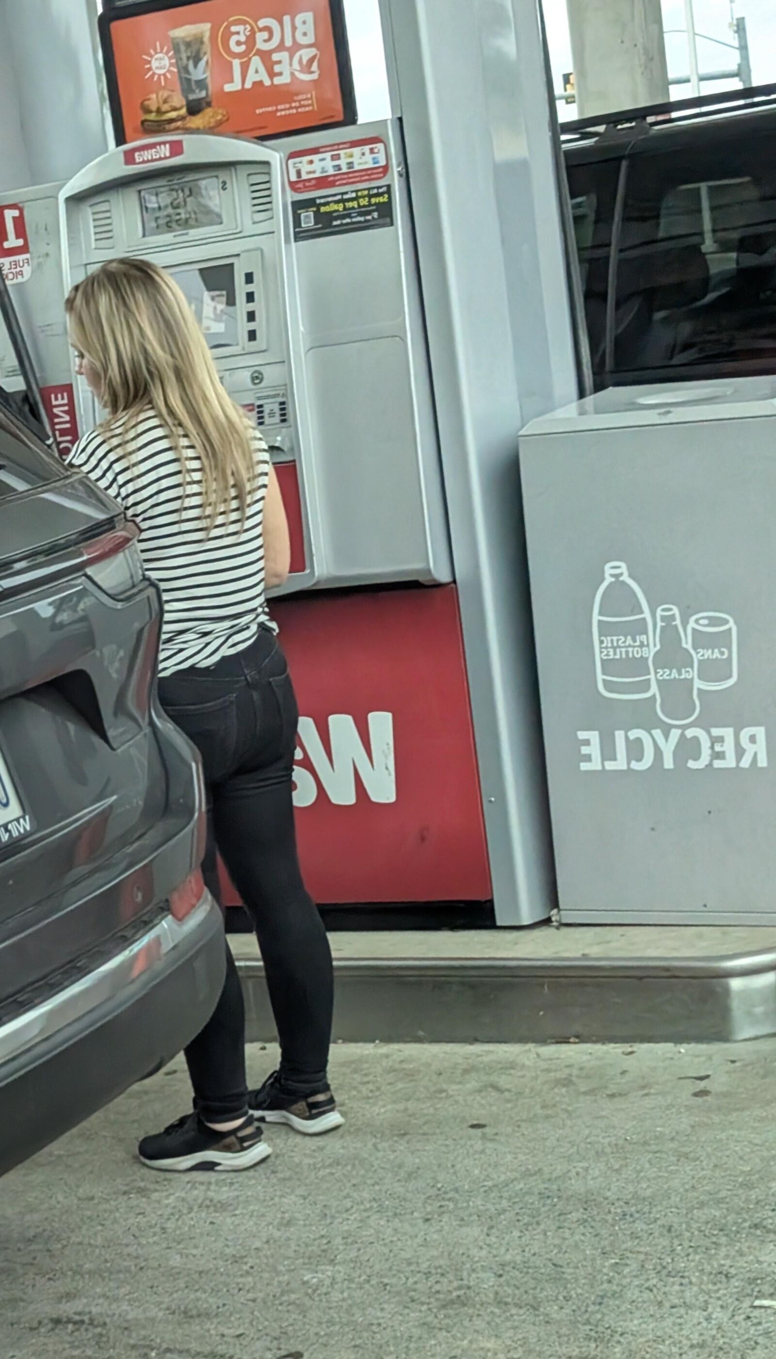 Cute blonde at gas station 
