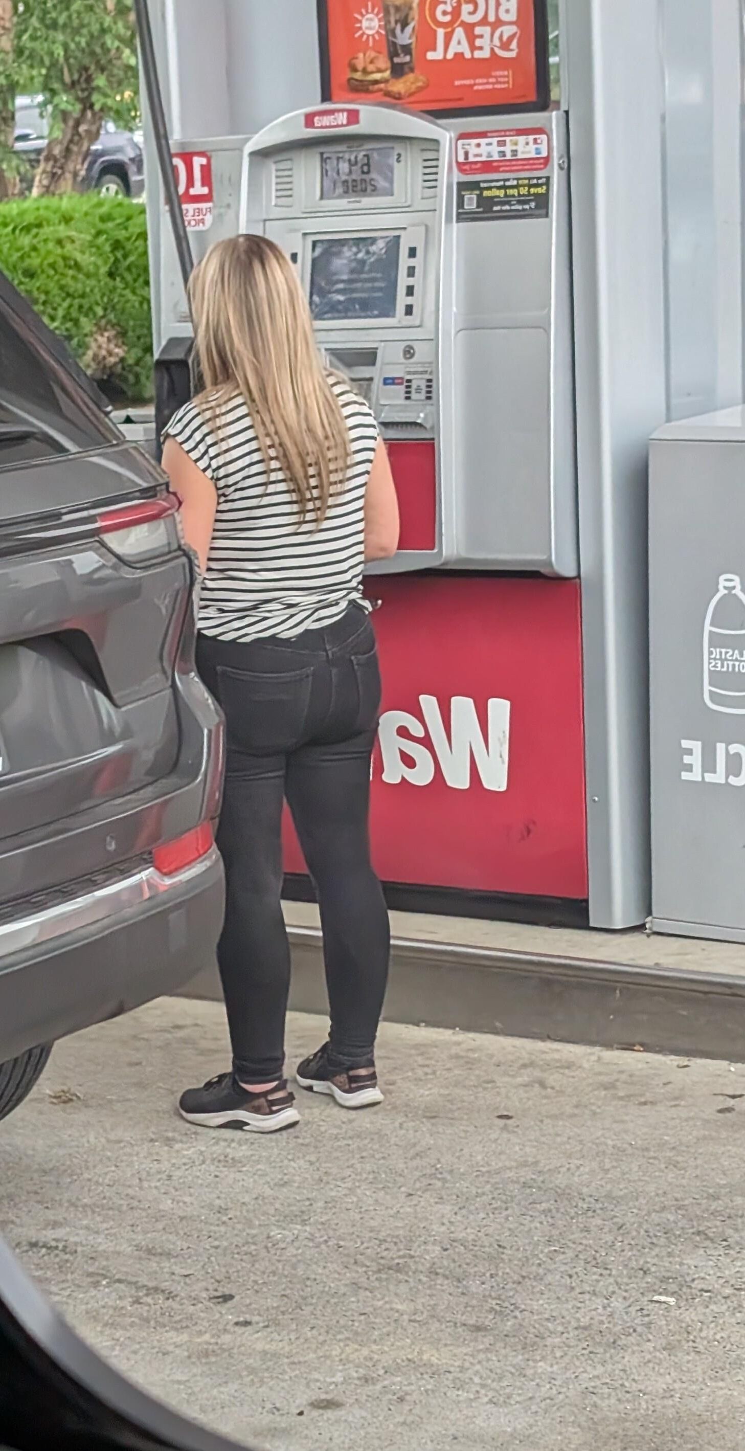 Cute blonde at gas station 