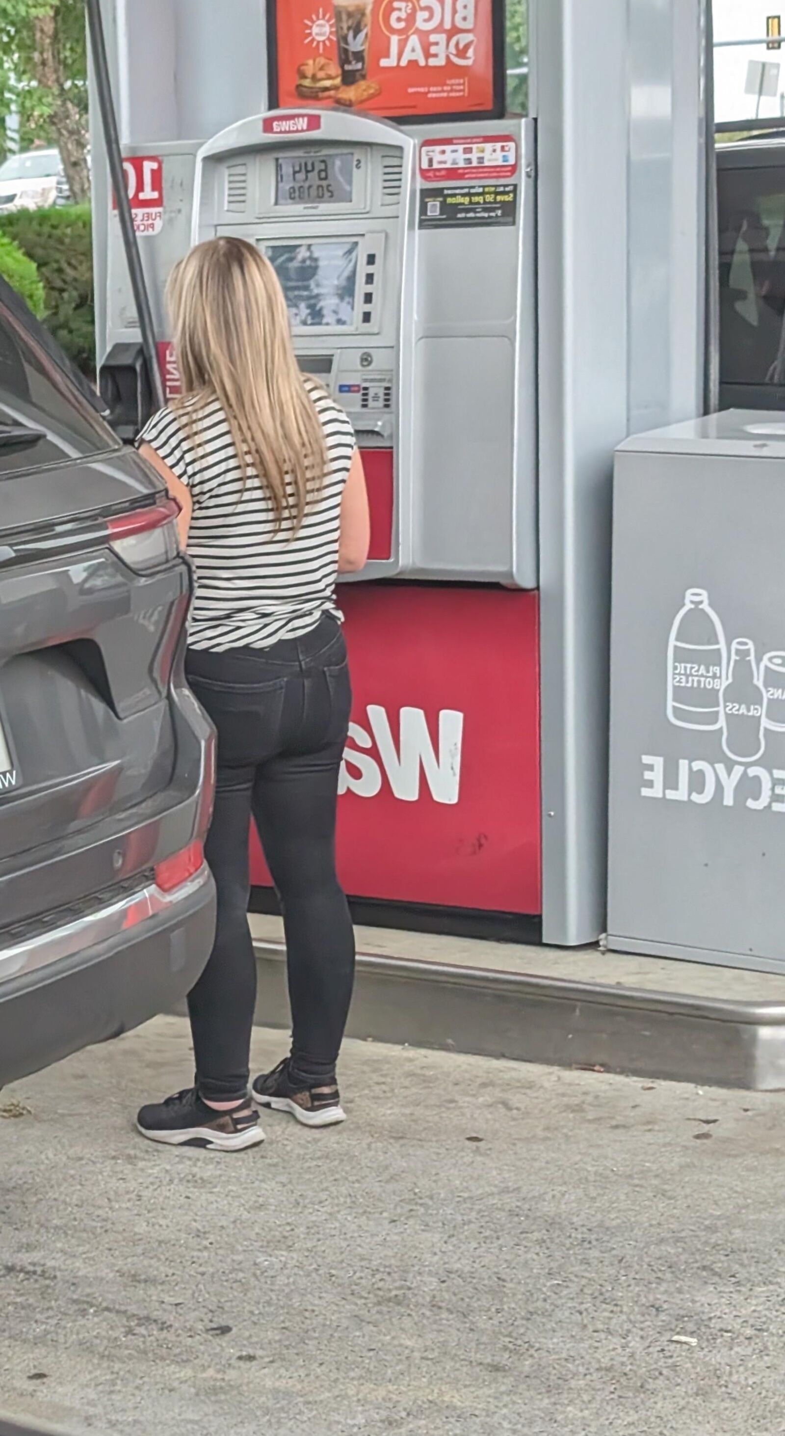 Cute blonde at gas station 