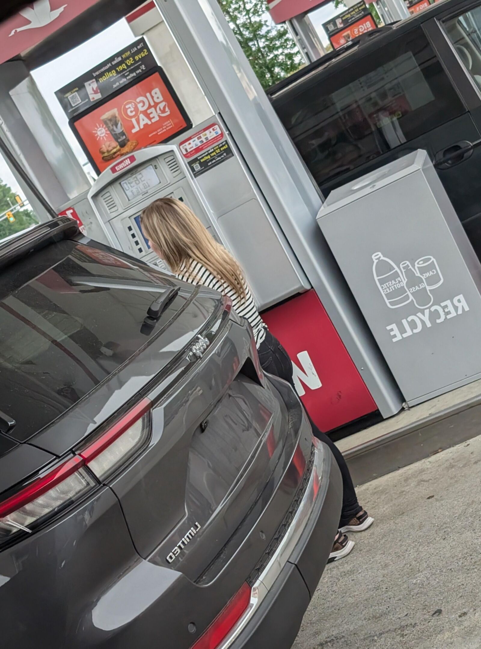 Cute blonde at gas station 